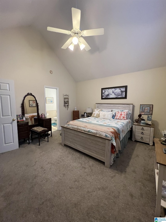 carpeted bedroom with ensuite bathroom, high vaulted ceiling, and ceiling fan