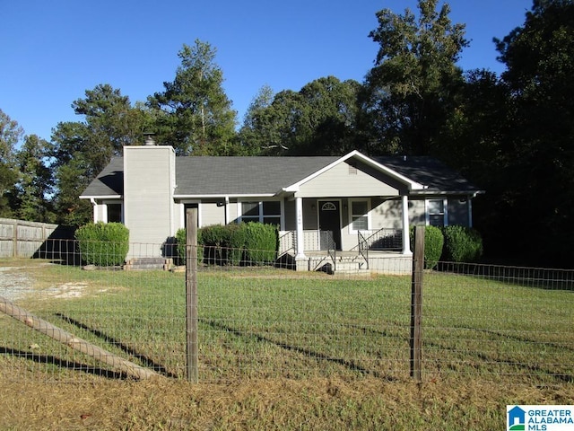 view of front of house featuring a porch and a front lawn