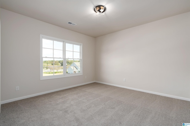 empty room featuring carpet flooring