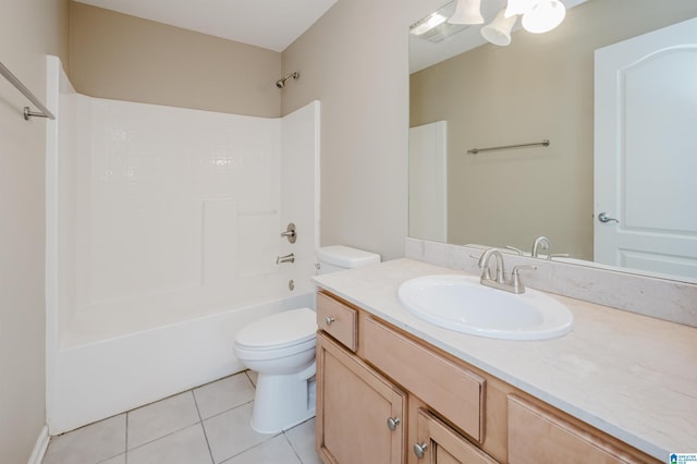 full bathroom with tile patterned floors, vanity, tub / shower combination, and toilet