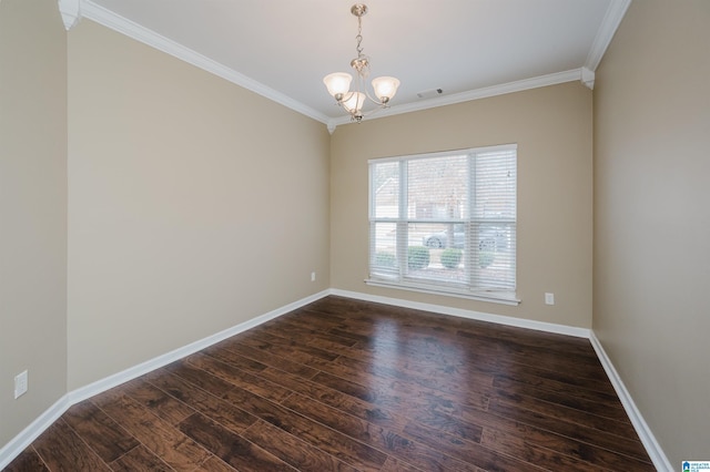 unfurnished room featuring ornamental molding, dark wood-type flooring, and a chandelier