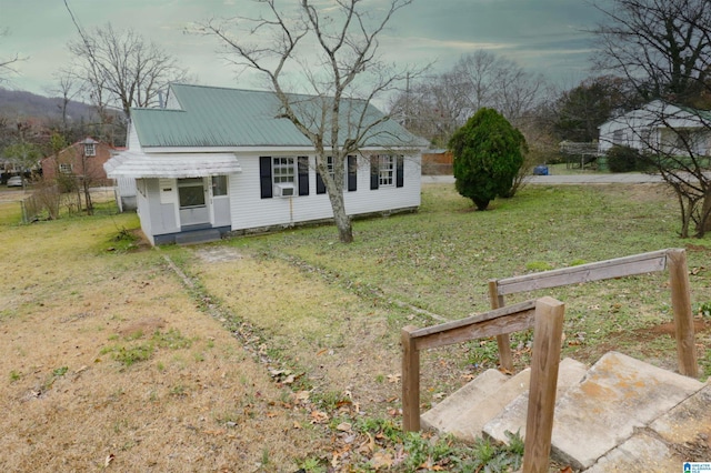 exterior space featuring a front yard