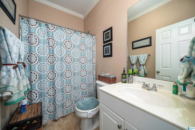 bathroom featuring tile patterned floors, vanity, toilet, and ornamental molding