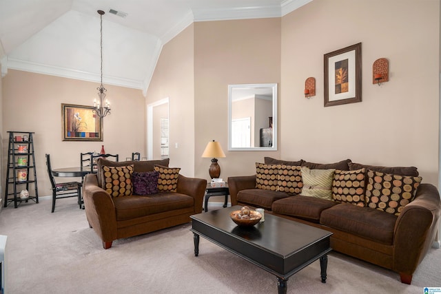 carpeted living room with crown molding, high vaulted ceiling, and a notable chandelier