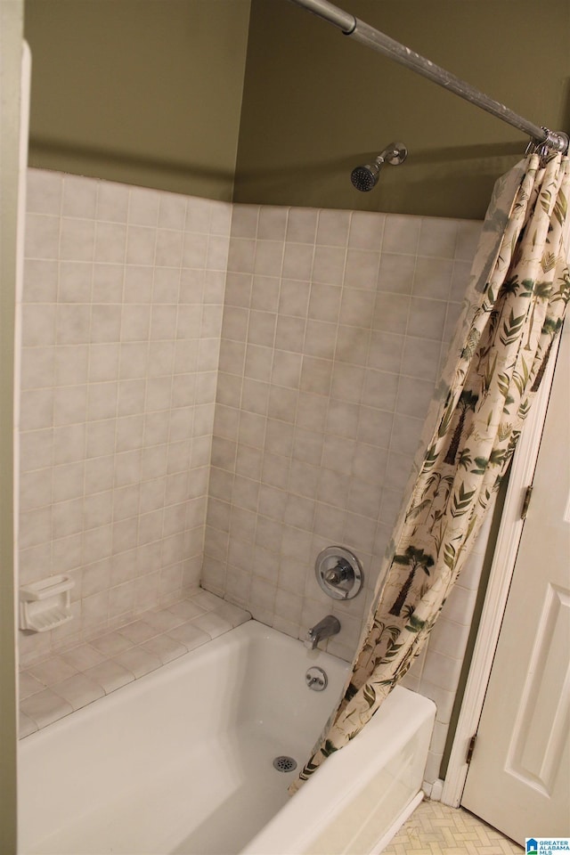 bathroom featuring shower / bath combo with shower curtain