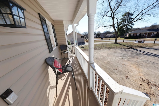 balcony featuring a porch