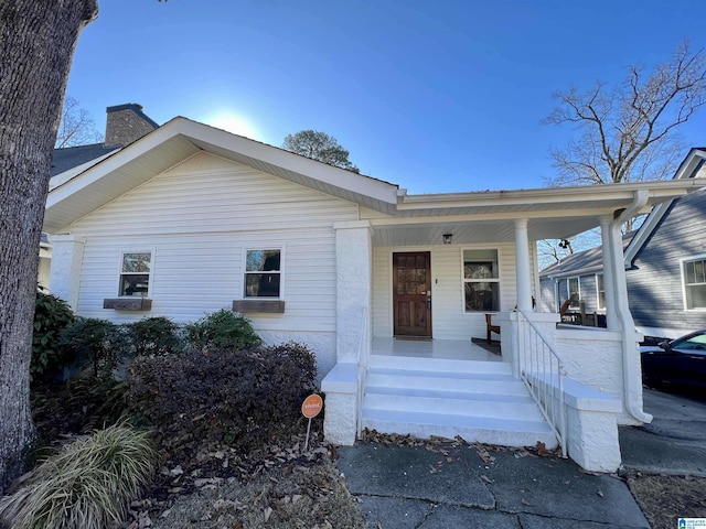 view of front of property featuring covered porch