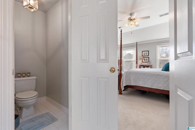 interior space with ceiling fan and light tile patterned floors