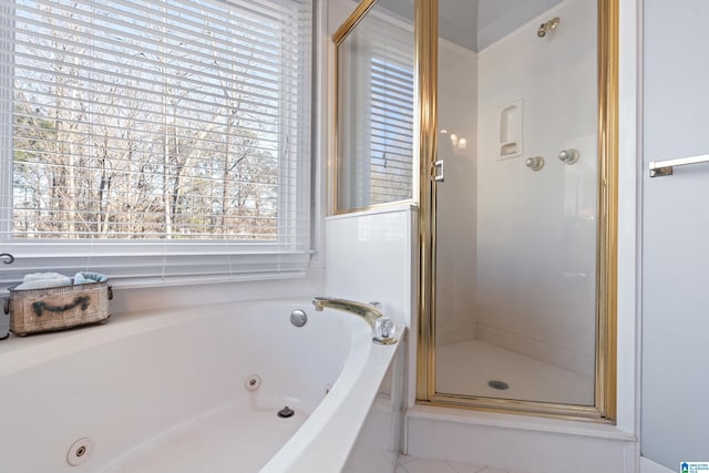 bathroom with shower with separate bathtub