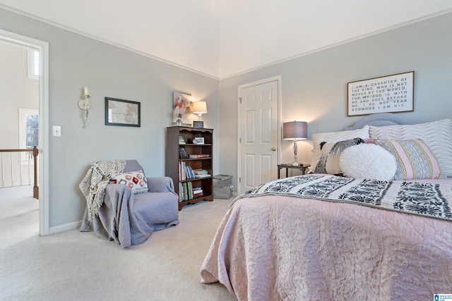 carpeted bedroom featuring a high ceiling