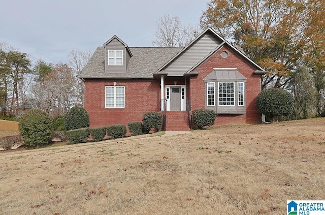 view of front of house with a front lawn