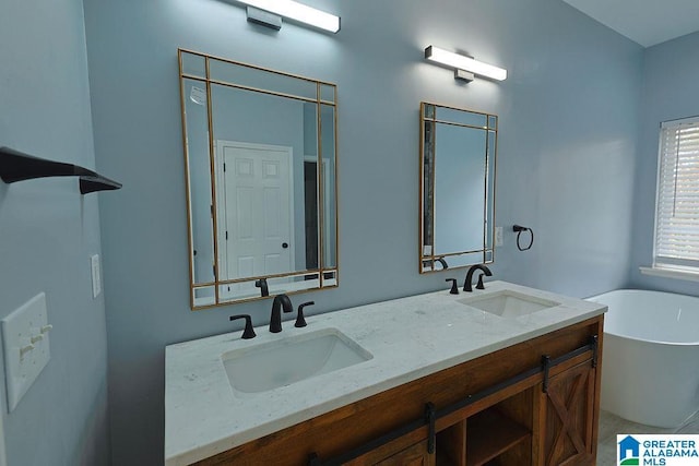 bathroom with vanity and a tub to relax in