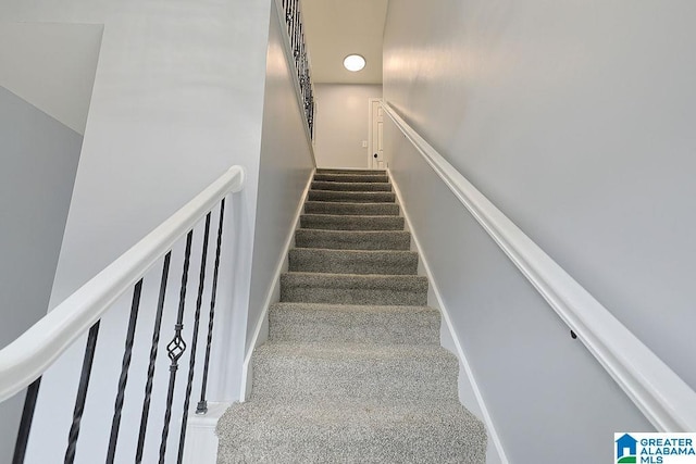 staircase with carpet