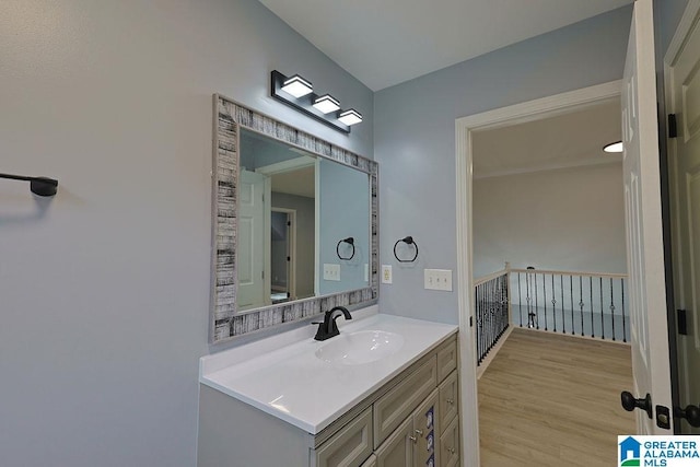 bathroom featuring wood-type flooring and vanity