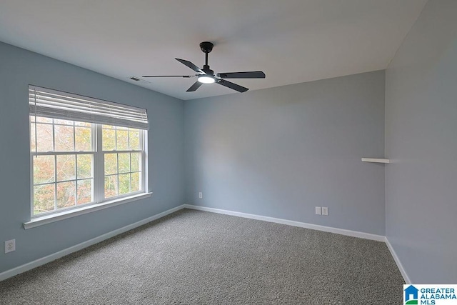 carpeted empty room with ceiling fan