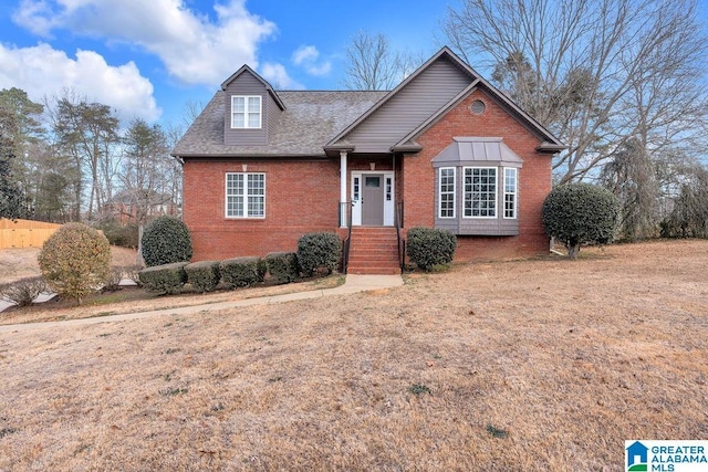 front facade with a front yard