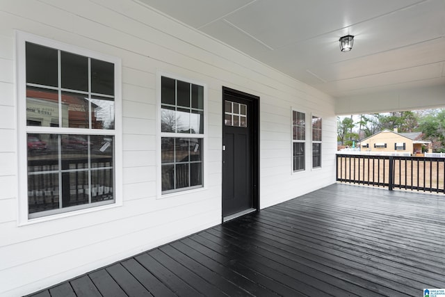 wooden terrace featuring a porch