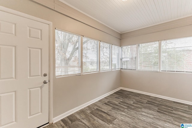 unfurnished sunroom with a wealth of natural light and wood ceiling