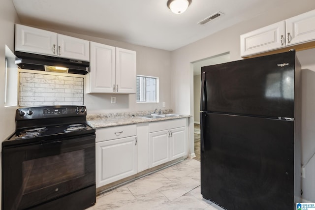 kitchen featuring black appliances, white cabinets, sink, and tasteful backsplash