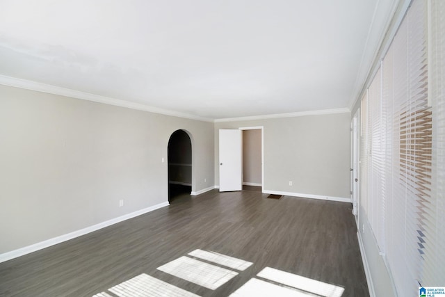 interior space with crown molding and dark wood-type flooring