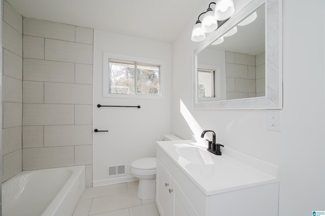 full bathroom with toilet, vanity, tile patterned floors, and tiled shower / bath