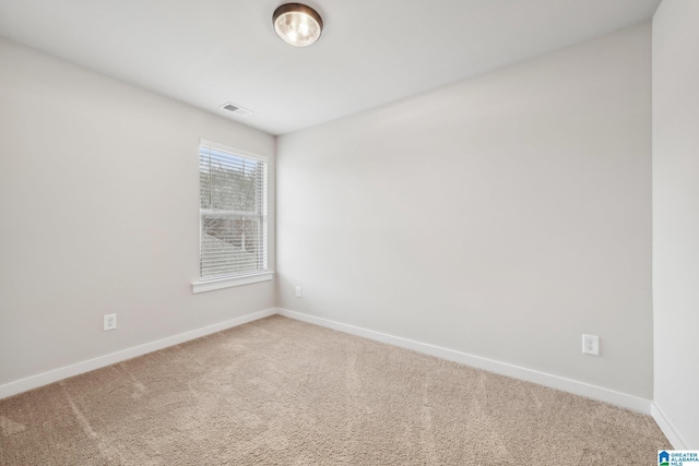 view of carpeted spare room