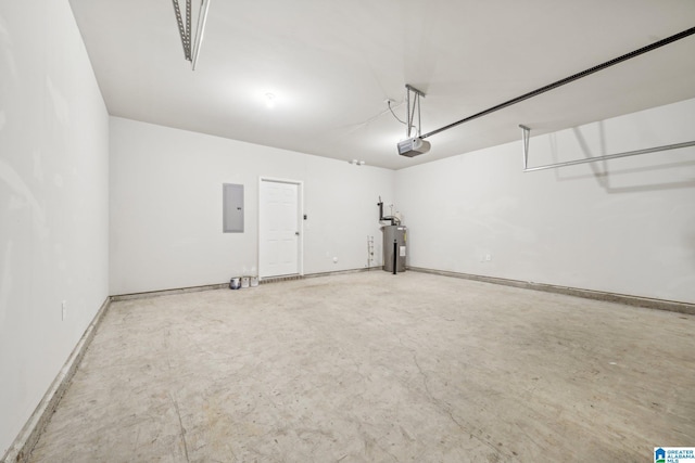 garage with electric panel, water heater, and a garage door opener