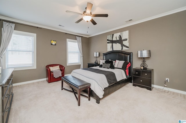 carpeted bedroom with ceiling fan, ornamental molding, and multiple windows