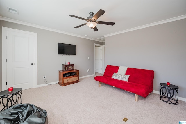 carpeted living room with ceiling fan and crown molding