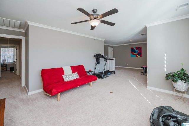 living area with carpet floors, ceiling fan, and ornamental molding