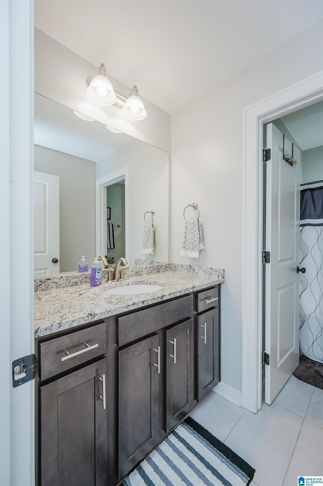 bathroom featuring vanity and tile patterned floors