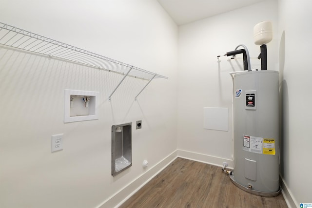 clothes washing area with electric dryer hookup, washer hookup, dark hardwood / wood-style flooring, and water heater