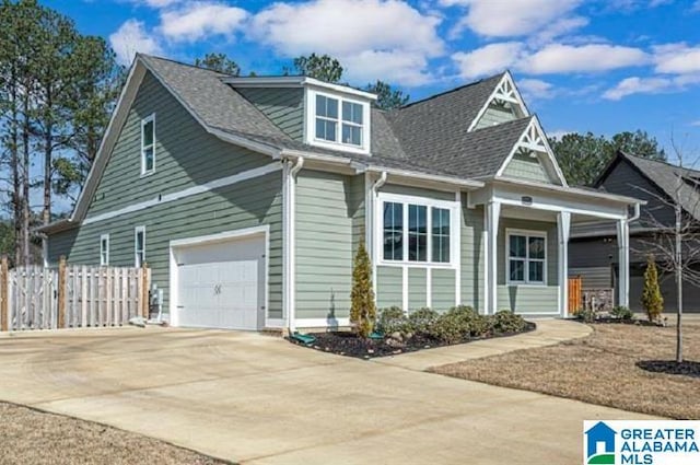 view of front of property featuring a garage