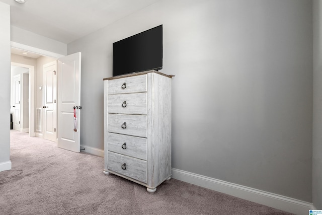 unfurnished bedroom with carpet flooring