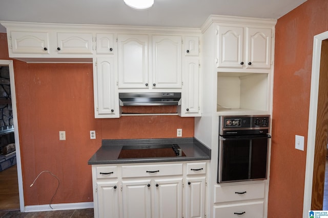 kitchen with white cabinets and black appliances