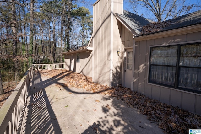 view of side of property featuring a deck