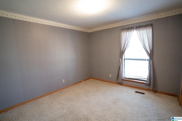 unfurnished room with light colored carpet