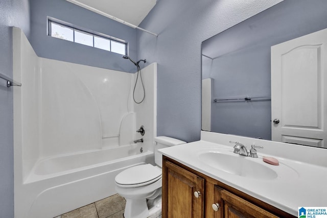 full bathroom featuring tile patterned floors, vanity, toilet, and bathing tub / shower combination