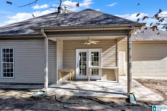 back of property featuring ceiling fan and a patio area