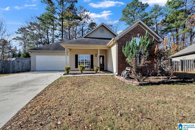 view of front of home featuring a garage and a front lawn