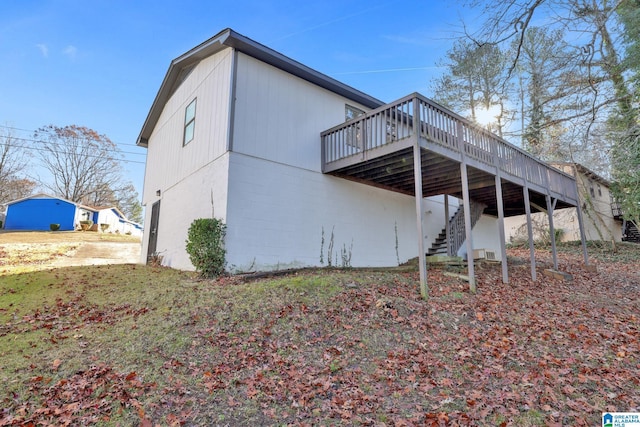 rear view of property with a deck