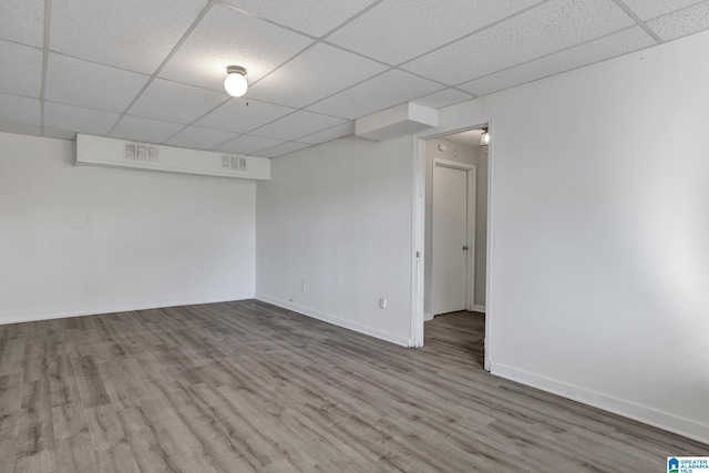 spare room with light hardwood / wood-style floors