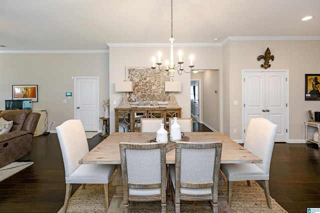 dining space featuring ornamental molding, dark hardwood / wood-style flooring, and a notable chandelier