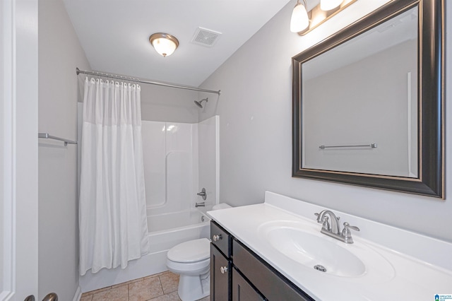 full bathroom with tile patterned floors, shower / bath combination with curtain, toilet, and vanity