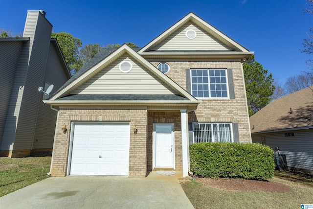 view of front of property featuring a garage