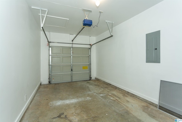 garage featuring electric panel and a garage door opener