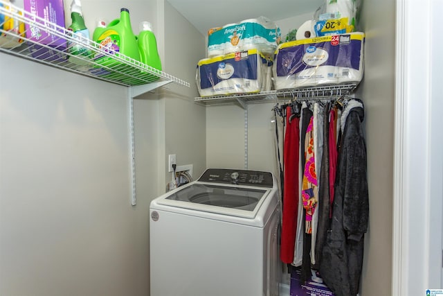 laundry room featuring washer / dryer