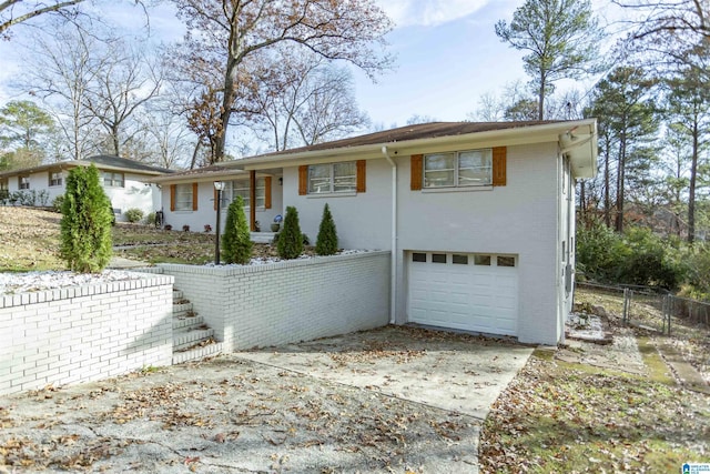 view of front of home featuring a garage