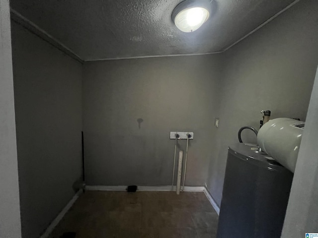 washroom with a textured ceiling