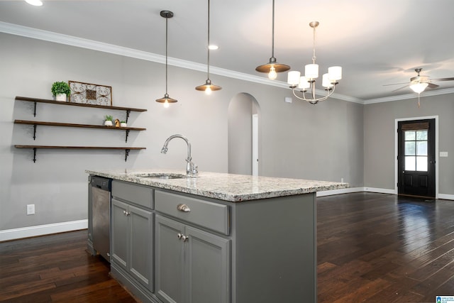 kitchen with pendant lighting, dishwasher, ceiling fan with notable chandelier, sink, and dark hardwood / wood-style floors